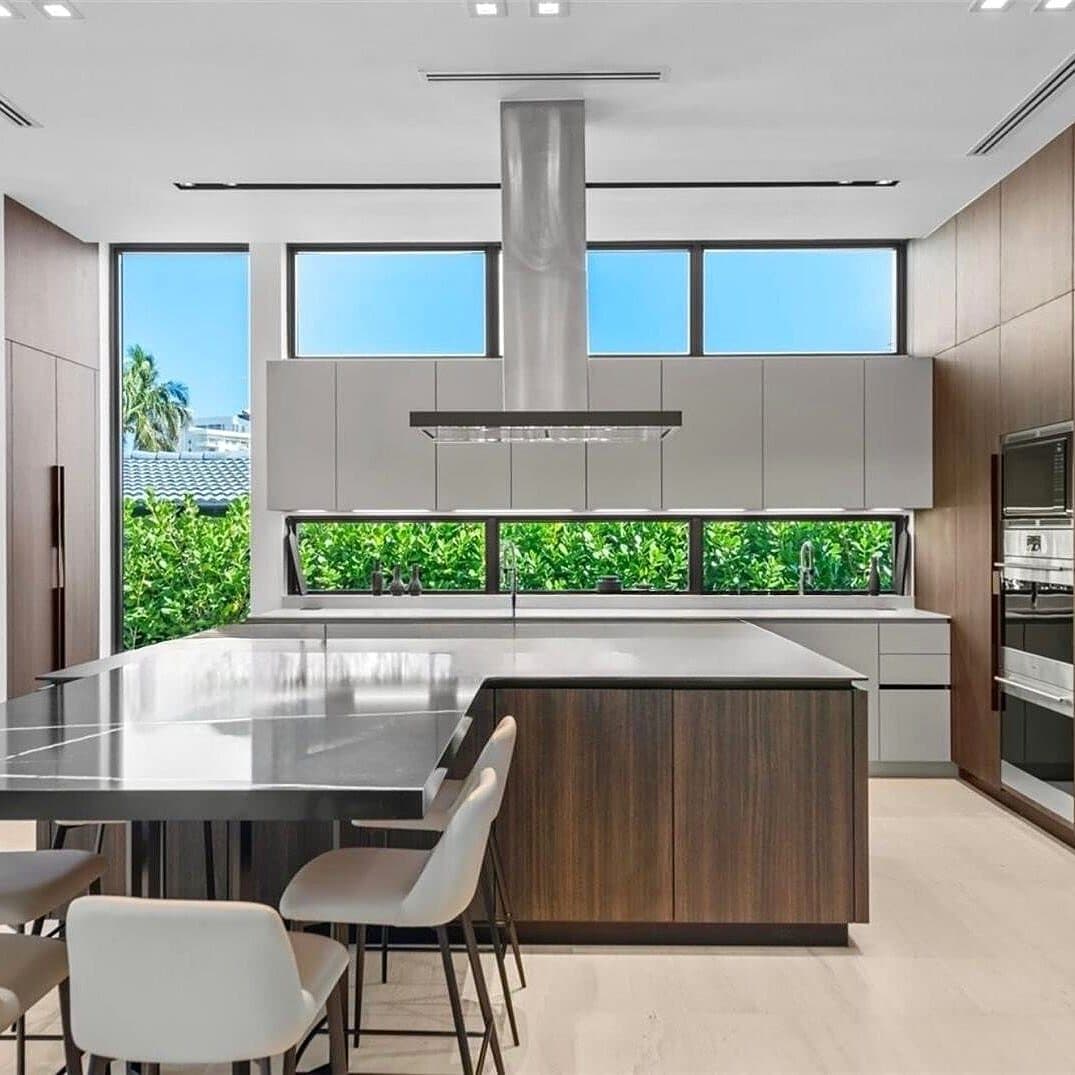 Modern melamine kitchen with waterfall island